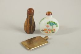 A CHINESE CARVED TIGERS EYE SNUFF BOTTLE, together with two other snuff bottles, (3).