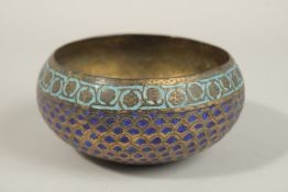 A FINE 19TH CENTURY INDIAN KASHMIRI ENAMELLED GILT COPPER BOWL, 12cm wide.