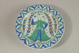 A TURKSIH OTTOMAN GLAZED POTTERY PLATE, 31.5cm diameter.