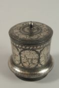 A 19TH CENTURY INDIAN BIDRI SILVER INLAID LIDDED VASE, 10cm high.