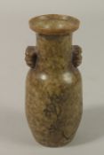 A CHINESE SOAPSTONE TWIN HANDLE VASE, with carved calligraphy, 15cm high.