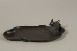 A SIGNED JAPANESE BRONZE TRAY, the corner with an okimono of a bird on a leaf, signed to base,