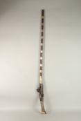 A BONE INLAID FLINTLOCK RIFLE.