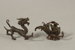 TWO BRONZE OKIMONOS OF A DRAGON AND PHOENIX, (2).