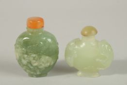 TWO CHINESE CARVED JADE SNUFF BOTTLES, (2).