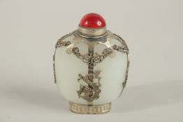A CHINESE METAL MOUNTED WHITE GLASS SNUFF BOTTLE AND STOPPER, the base with engraved character mark,