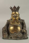 A LARGE CHINESE GILDED BRONZE SEATED BUDDHA, 34cm high.