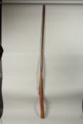 A LONG INDIAN MATCHLOCK RIFLE. 186cm long.