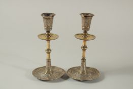 A PAIR OF 19TH CENTURY PERSIAN QAJAR STYLE ELKINGTON CANDLESTICKS, pattern no. 16056 17cm high.