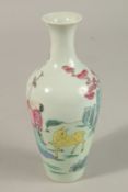 A SMALL CHINESE FAMILLE ROSE PORCELAIN VASE, 17.5cm high.