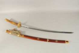 A 20TH CENTURY JAPANESE KATANA SWORD AND SHEATH, 104cm long.