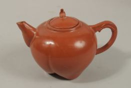 A CHINESE PEACH FORM YIXING TEAPOT, 13cm high.