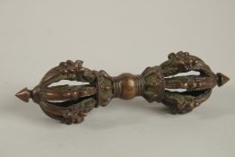 A VERY FINE TIBETAN BRONZE VAJRA, 15cm long.