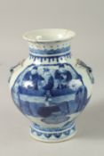 A CHINESE BLUE AND WHITE PORCELAIN VASE, with moulded ring handles and painted with figures, base