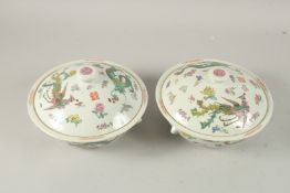 A PAIR OF CHINESE FAMILLE ROSE PORCELAIN TUREENS AND COVERS.