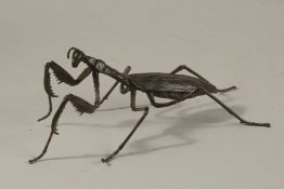 AN ARTICULATED BRONZE OKIMONO OF A PRAYING MANTIS.