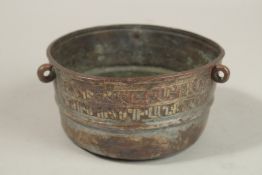 AN 18TH CENTURY OTTOMAN ARMENIAN INSCRIBED TINNED COPPER BOWL, dated 1211, translation: 'in memory