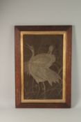 A CHINESE METAL THREAD EMBROIDERED SILK PANEL, depicting cranes, framed and glazed, 72.5cm x 49.