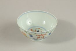 A CHINESE DOUCAI PORCELAIN CUP, with six-character mark, 10cm diameter.