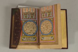 AN 18TH CENTURY OTTOMAN TURKISH LEATHER BOUND ILLUMINATED QURAN encase in leather bound box,