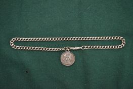 A silver boxing pendant and chain.