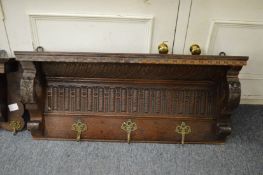 Carved oak coat rack.