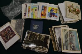 A small quantity of saucy and other postcards.