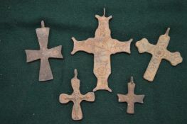 Bronze crucifixes.