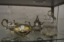 Plated cruet with bottles and three other items.