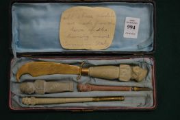 A cased desk set made from the lava of mount Vesuvius.