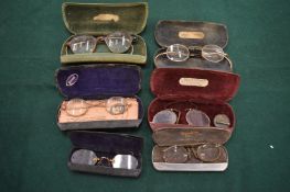 A group of old spectacles.