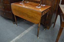 A 19th century mahogany Pembroke table.