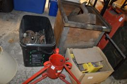 Christmas tree holder and various tools.