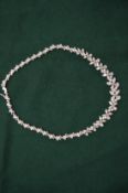 A silver and diamante necklace.