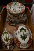 A quantity of floral decorated ironstone china dinnerware.