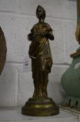 A gilt bronze standing classical female figure.