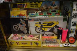 Pelham puppet, boxed model of a Yamaha motorbike and other toys.