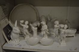 A group of Berlin porcelain white glazed animals, figures and dishes.