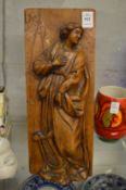 A good carved wood figural panel.