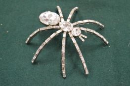 A large spider brooch by Butler & Wilson.