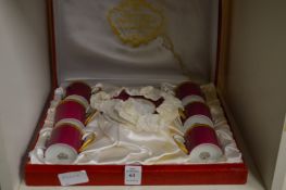 A cased coffee service.