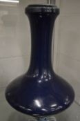 A large Chinese dark blue ground bottle shaped vase.
