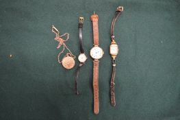 A ladies 9ct gold wristwatch with enamel dial together with two other watches and a locket and