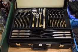 A twelve place canteen of cutlery.