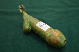 A bronze phallic.