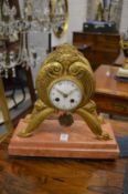 Decorative gilt brass and marble mantel clock.
