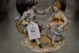 A Sitzendorf porcelain figural group, the flower seller.