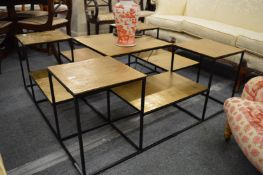 An unusual gilt metal and wrought iron sectional coffee table.