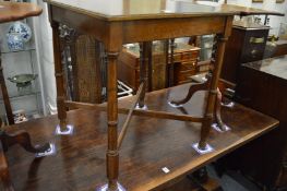 An oak occasional table.