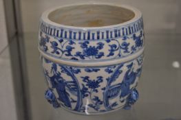 A Chinese blue and white barrel shaped vase.